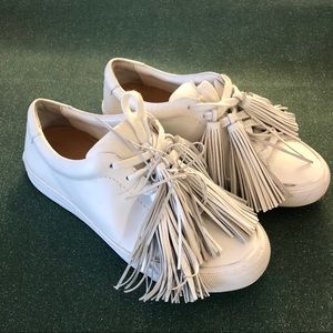 White Loeffler Randall white sneakers with tassels